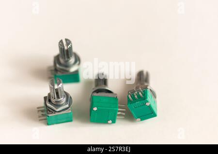 Variable resistor isolated on white background. Electronic parts concept. potentiometer. Stock Photo