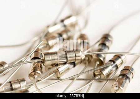 Fuse electric fuse miniature on white background. Stock Photo