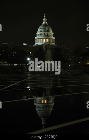 The US capitol is pictured on the night before Inauguration Day. Fencing were erected and traffic was restricted on some streets in downtown Washington for the occasion. After his election over Democratic candidate Kamala Harris on November 5, Donald Trump will be inaugurated on Monday, January 20. He will become the 47th President of the United States. The inauguration ceremony will place inside the US Capitol, due to a cold snap. The last time an indoor ceremony was held was in 1985. (Photo by Apolline Guillerot-Malick/SOPA Images/Sipa USA) Stock Photo