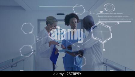 Image of chemical formula over diverse surgeons discussing work Stock Photo
