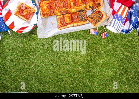 july 4th holiday party pizza, Fourth of July, Patriotic Independence day festive and picnic food. Pepperoni, tomato and black olive pizza with lot of Stock Photo