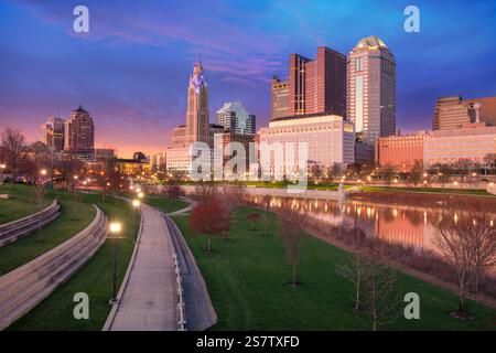 Columbus, Ohio, USA. Cityscape image of Columbus, Ohio, USA downtown skyline with the reflection of the city in the Scioto River at spring sunset. Stock Photo