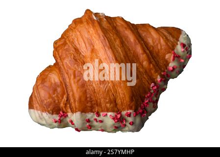 Crispy sweet red croissant with pistachio, raspberry and strawberry on a white background Stock Photo