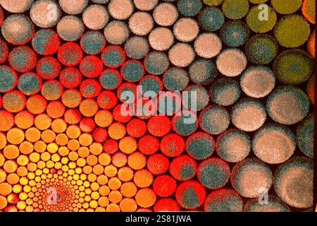 Soft carpet with bright patterns, background. Fluffy rug, interior element, flooring, carpet with geometric round pattern Stock Photo