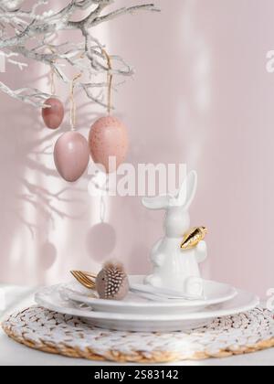 Easter Bunny Figurine With Table place setting Stock Photo