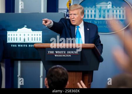 UNITED STATES - APRIL 6: President Donald Trump mimics a Iranian ...