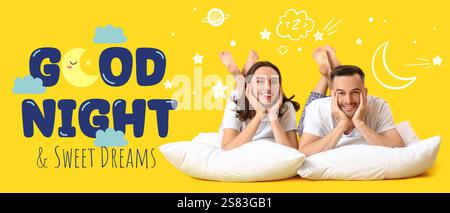 Young couple with pillows lying on yellow background Stock Photo