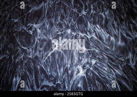 Abstract Texture of Frost Water Surface Swirling Patterns in Dark and Light Tones. Frozen Sea or lake background Stock Photo