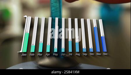 Image of diagrams over test tube spinning Stock Photo