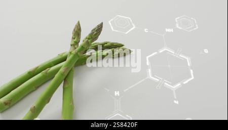 Image of chemical formula over asparagus Stock Photo