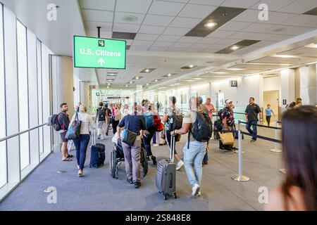 Miami Florida,MIA International Airport,inside interior,terminal concourse gate area,arriving international passengers,queue line for U.S. Citizens cu Stock Photo