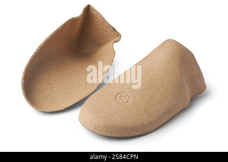 pair of hollow cardboard shoe inserts isolated white background, cost effective tools used to maintain the shape of new shoes during storage transport Stock Photo