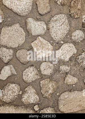 Stone walkway on the ground. Abstract background and texture for design. Stock Photo