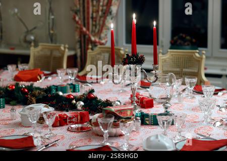 Table set for celebration Christmas dinner in living room, France Stock Photo