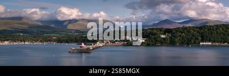 Bangor Pier and the Menai Strait backed by the Carneddau and Glyderau Mountains of Snowdonia (Eryri) in summer, Anglesey, North Wales Stock Photo