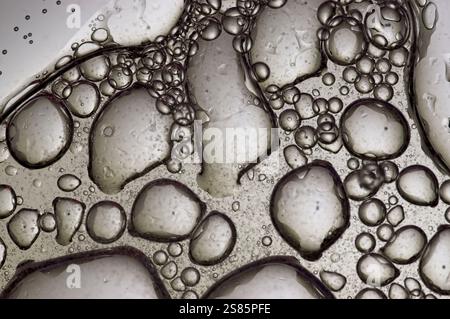 Abstract bubbles in close up over chrome Stock Photo