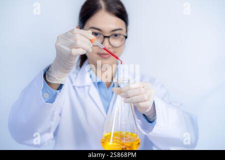 A female scientist working in a laboratory. Stock Photo