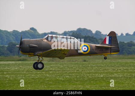 RAF North American Harvard AT-16 IIB in flight but landing Stock Photo