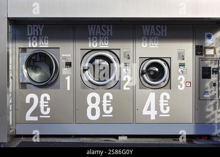 Public laundry, washing machines, tumble dryers, outdoor launderette, self-service, Ring of Kerry, Iveragh Peninsula, Ireland, Europe Stock Photo