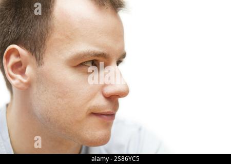 Horizontal closeup portrait of young blond man with short hair, Germany, Europe Stock Photo