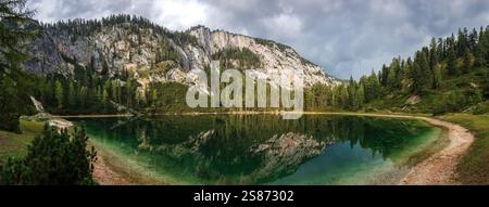Lake Ahornsee in Alp mountains, Styria, Austria. Beautiful landscape scenery and reflection of rock mountain peak at water surface Stock Photo