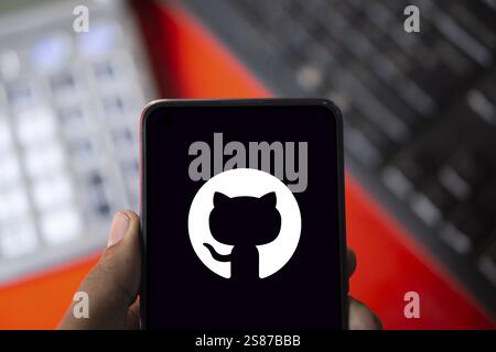 github logo is displayed on smartphone. GitHub is a proprietary developer platform Stock Photo