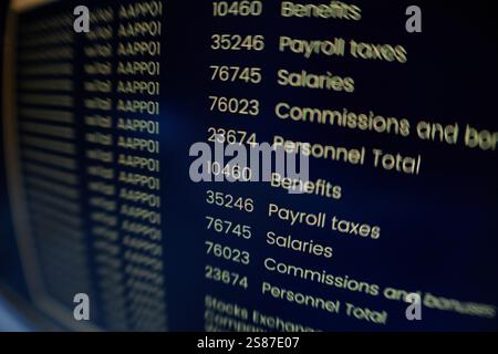 Extreme close up on computer screen displaying orange lines of coding program on black background, fish eye effect Stock Photo