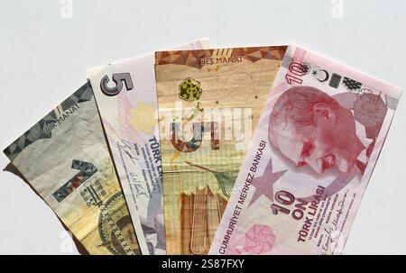 Colorful Azerbaijan Manat and Turkish Lira Banknotes isolated on white Stock Photo