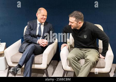 Ukraine's President Volodymyr Zelenskyy, center, talks to Germany's ...