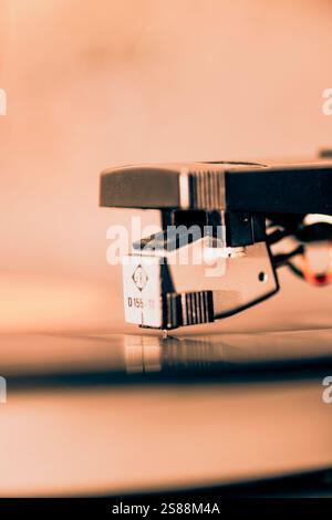 Close-up of the pickup of a record player with focus on the stylus Stock Photo
