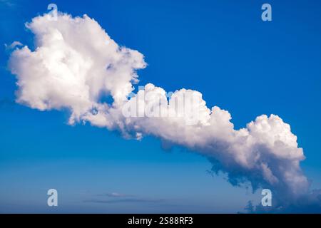 white clouds of different shapes in a blue sky Stock Photo