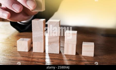 Financial advisor shows the client the chance of asset growth on stock market. Stock Photo