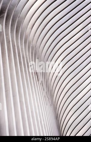 An architectural detail shows an alternating pattern of light and shadow that reaches into the sky. Stock Photo