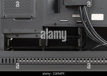 Side view of empty  big tower, PC case, chassis, without  right  metal panel . Place for three HDDs. Storage capacity for data storage needs. Stock Photo