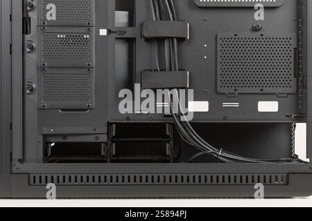 Side view of empty  big tower, PC case, chassis, without  right  metal panel . Place for four HDDs or up to eight SATA SSDs.  Storage capacity for dat Stock Photo