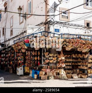 Colourful stalls filled with woven baskets and handmade goods in the Souk of Essaouira, Morocco. Stock Photo