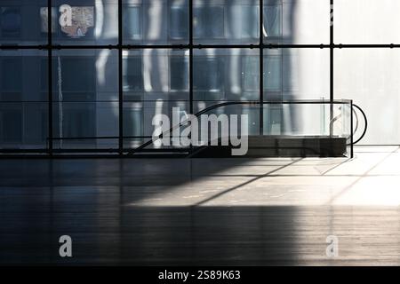 empty office building space with down escalator Stock Photo