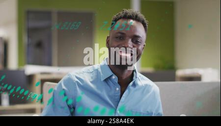 Image of data stream processing over happy african american casual businessman smiling at office Stock Photo
