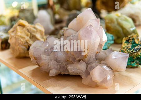 beautiful crystal stones on a wooden shelf. precious stones Stock Photo