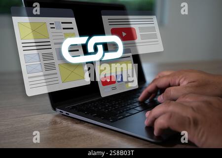 A person is typing on a laptop with a link to a website displayed on the screen. Backlinks Technology Online Web Businessman Stock Photo