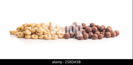 Breakfast cereal rings and chocolate balls isolated on a white background. Stock Photo