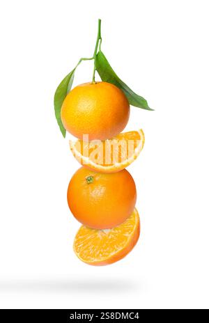 Ripe juicy tangerines falling on white background Stock Photo