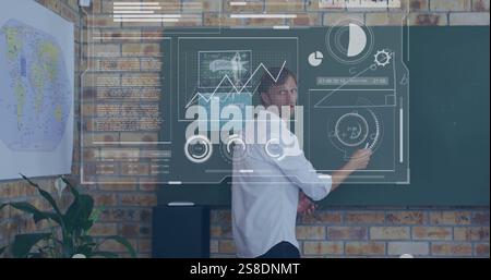 Image of statistics and data processing over caucasian male teacher Stock Photo