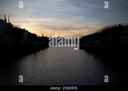 sunset over the river liffey in dublin city centre dublin republic of ireland Stock Photo