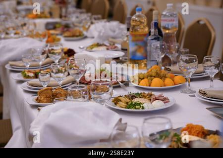 Exquisite Banquet Table Set with an Abundance of Gourmet Delicacies. Stock Photo