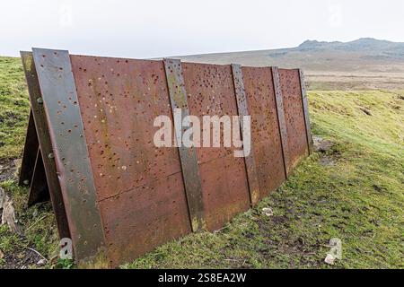 Bullet holes in military firing range at Rowtor Target Railway, Dartmoor, UK Stock Photo