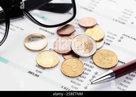 Graph Of Stock Market With Stacks Of Coins Stock Photo
