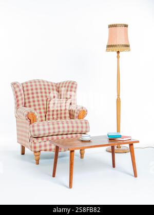 White studio shot of an empty minimal room set with old 1960's/1970's furniture. Stock Photo