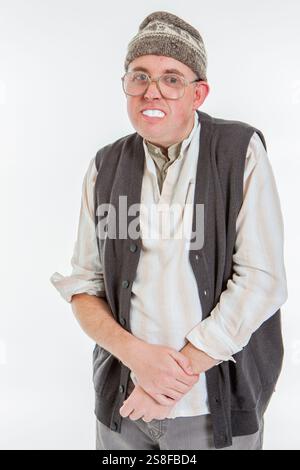 A cheeky grin from a comic caricature of an English rural country bumpkin character. Stock Photo