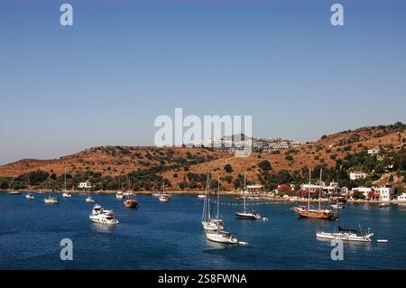 Sailboats docked near Gumusluk, a seaside village and fishing port in Bodrum, Mugla province, southwestern Turkey. (July 2009) Stock Photo